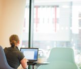Postgraduate student studying in Aspire Cafe, Jubilee Campus