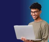 Student looking at a laptop