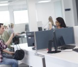 Female member of staff advising female undergraduate student in University Park Central Student Service Centre, Cherry Tree Lodge